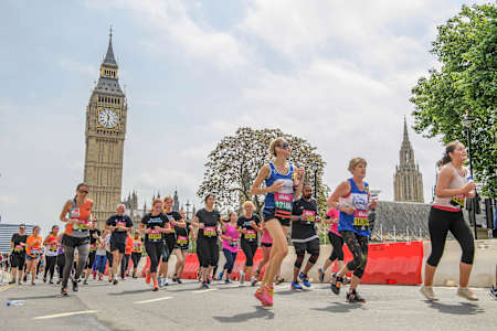 Runners pass iconic landmarks including Big Ben at Vitality London 10,000