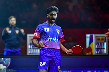Sathiyan Gnanasekaran celebrates winning a point during a match at Ultimate Table Tennis