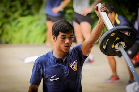 Lallianzuala Chhangte of Chennaiyin Football Club lifts weights during a training session.