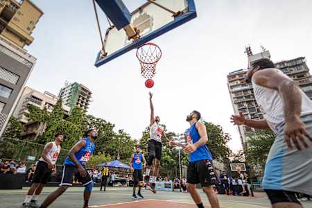 Players compete on a half court basketball game at the Red Bull Reign 2019 India Finals.