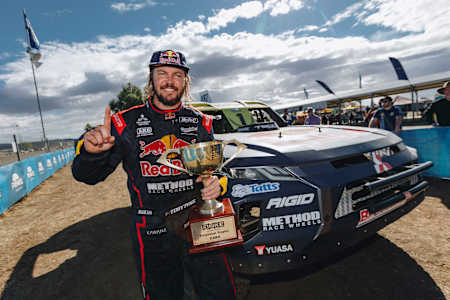 Toby celebrates the win at the 2021 Finke Desert Race.