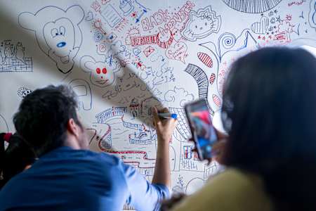 The participants doodling at National Final while awaiting results