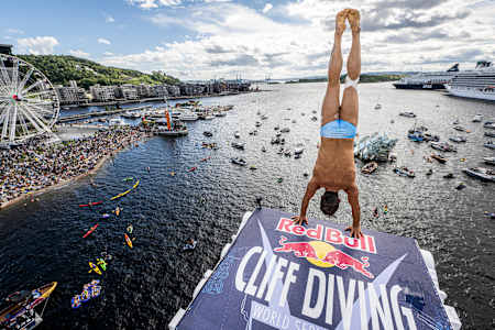 In 2024, Constantin Popovici holds an incredible armstand 27m above the Oslofjord during the Red Bull Cliff Diving competition in Oslo