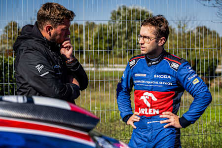 Engineer Marcis Kenavs talks set-up with Marczyk