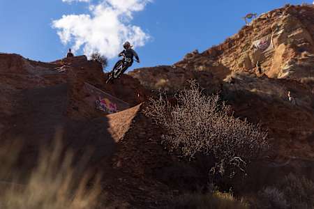 Casey Brown drops into her line during practice at Red Bull Rampage.