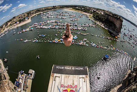 Gary Hunt dives off the platform at the Red Bull Cliff Diving event at Possum Kingdom Lake