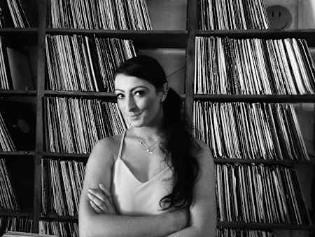 DJ Rebecca Vasmant with her record collection