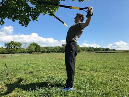 How to perform reverse fly using TRX