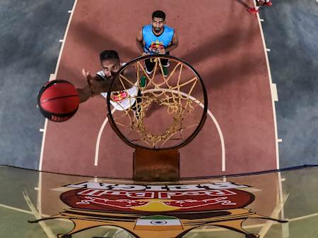 Players compete on a half court basketball game at the Red Bull Reign 2019 India Finals.