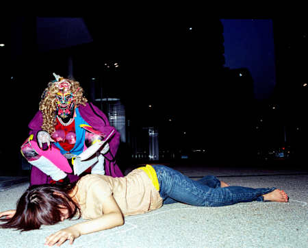 Rammellzee as Vain the Insane. His other alter egos included Rip-cord Rex and Chaser the Eraser.