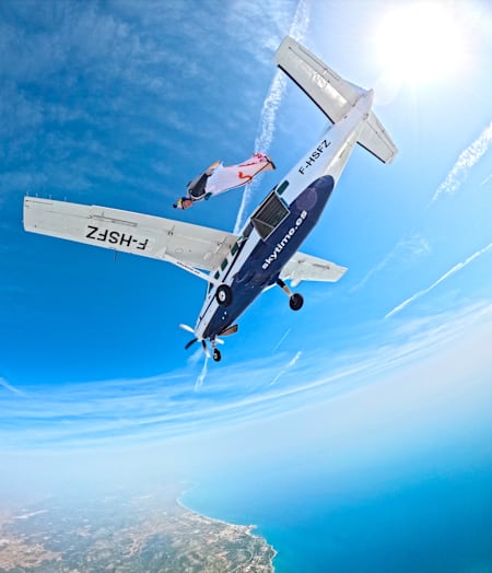 Amber Forte flies above the Spanish coastline during a training session