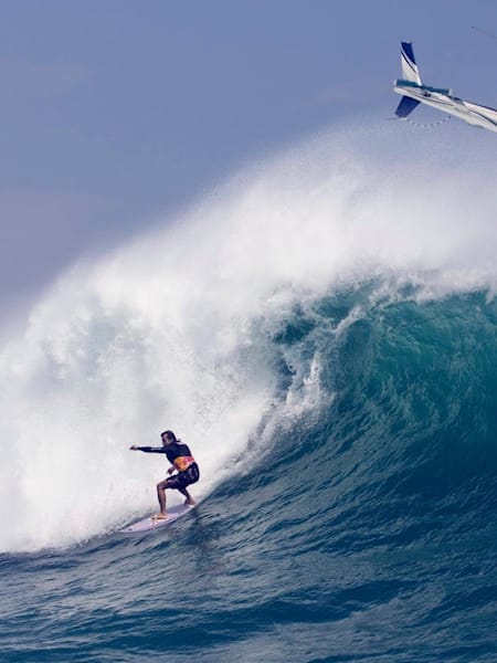 Carlos Burle surfing big wave near Wakayama, Japan on 5th September 2006