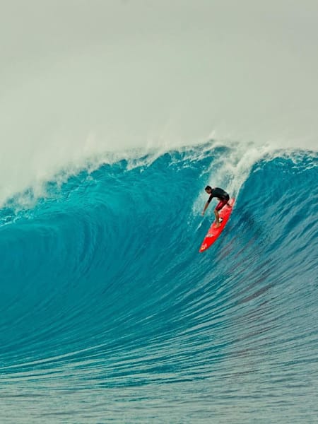 Ian Walsh surfs big waves off Tavarua Island, Fiji