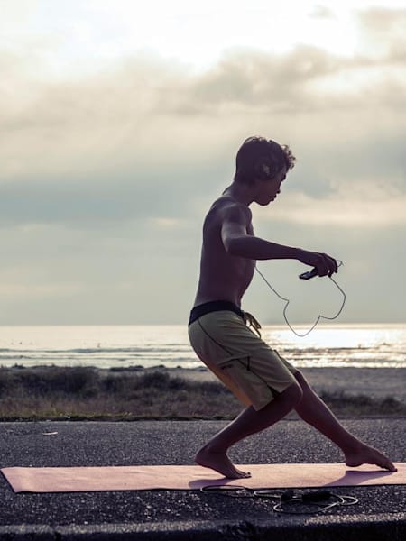 Hiroto Arai warms up for a surf session at Miyazaki, Japan on August 31th 2012
