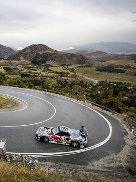 Conquer the Crown - RX-7 at hairpin corner