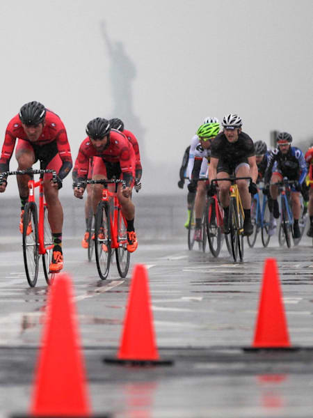 Fixed gear cyclists race at the Red Hook Criterium in Brooklyn in 2014