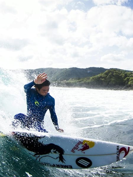 Hiro Arai surfs over the Bira Reef