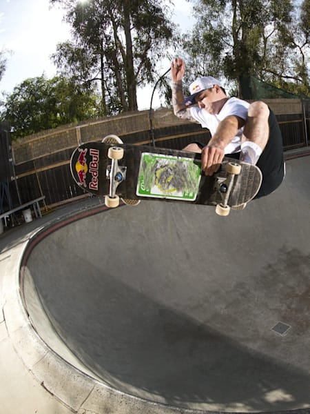 Chris Russell executes a frontside air at "This Is Live...Pool Session" on Red Bull TV, in Huntington Beach on 25 July,  2016