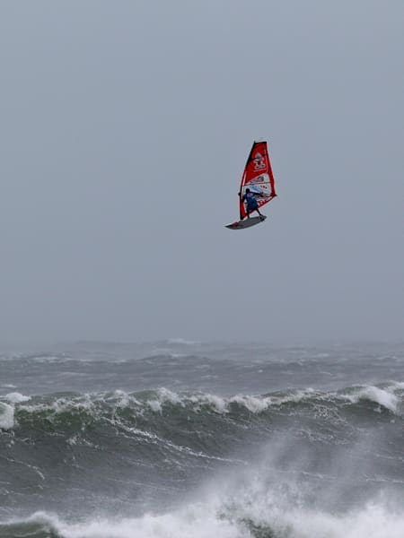 A windsurfer battle makes the most of Force 10 conditions during Red Bull Storm Chase 2016
