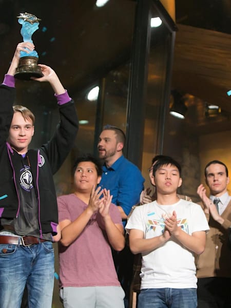 Pavel holding up his well-earned trophy