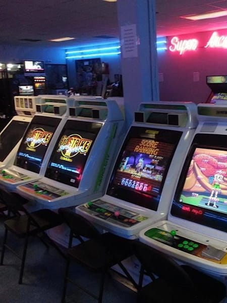 Bank of arcade cabinets in old Super Arcade location
