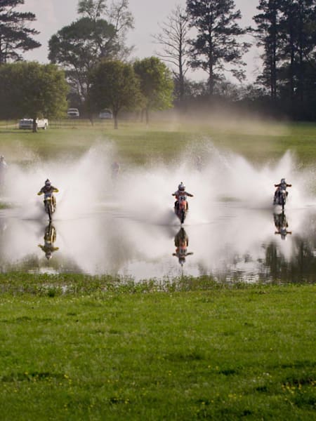 Travis Pastrana and friends skim on water at Kevin Windham's new Farm 14 MX Facility in Centerville, Mississippi