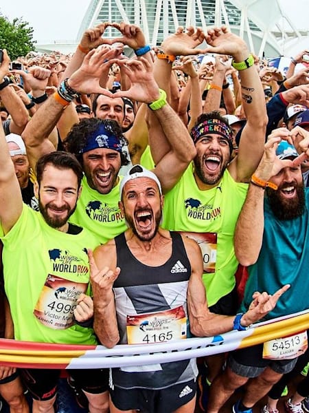 Participants cheer in front of the starting line prior to the Wings for Life 2016 Valencia in Valencia, Spain