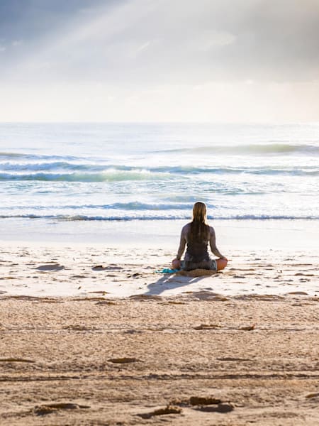 Yoga and surfing can help you live a happier, healthier life