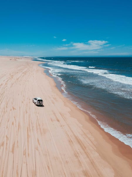 Driving along the beach, Australia.