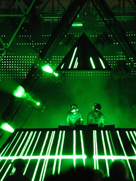 A photo of Daft Punk performing at the 2006 Coachella Festival.