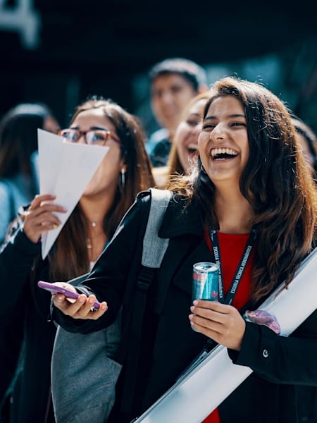 Participants celebrate at the national final of Red Bull Paper Wings at the Aviation Museum in Santiago, Chile on April 12, 2019.