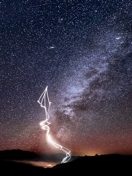 The Red Bull Air Force Team performs a nighttime wingsuit flight in front of a Milky Way backdrop, in Marfa, TX, USA on 15 November, 2020.
