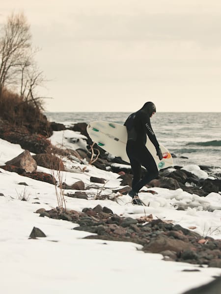 Jamie Sterling walking down to the beach in the Great Lake Region, MN, USA on March 9th 2011