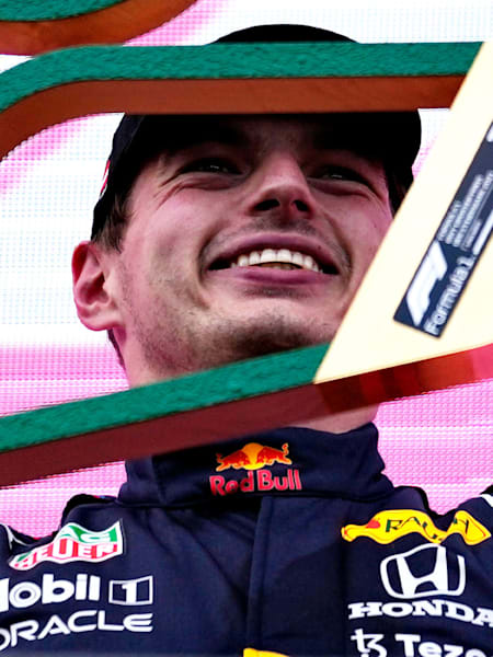 Picking Up His Home Race Trophy