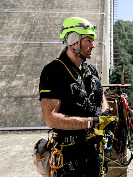 Thomas Van Tonder prepares for Red Bull Bridge Bars at Bloukrans Bridge in South Africa on 29 September 2026, wearing safety equipment beside a climbing specialist