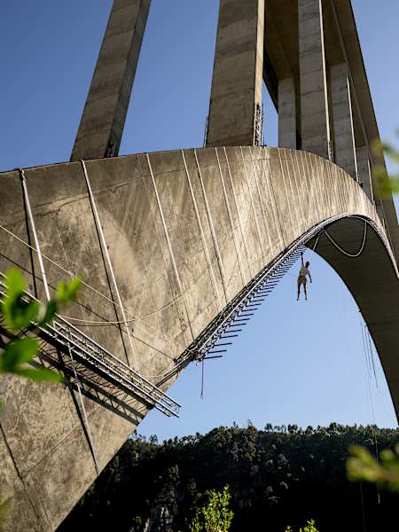Thomas van Tonder training at the Bloukrans Bridge in the Tsitsikamma, South Africa. Later this month, he will try to cross the bridge on monkey bars suspended beneath the bridge's arch.