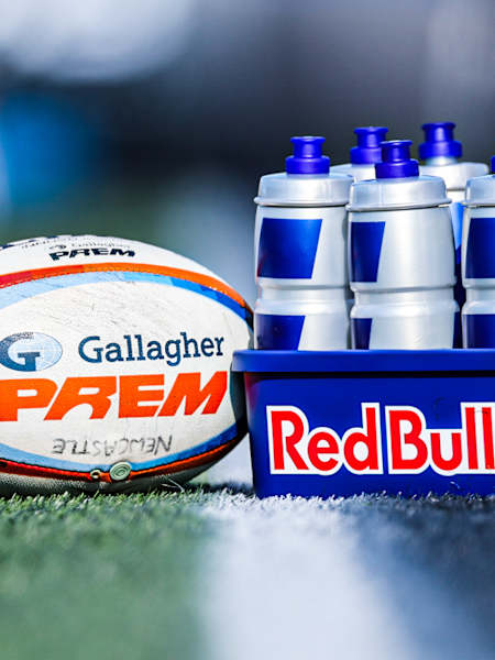 Gallagher PREM ball and Red Bull water bottles