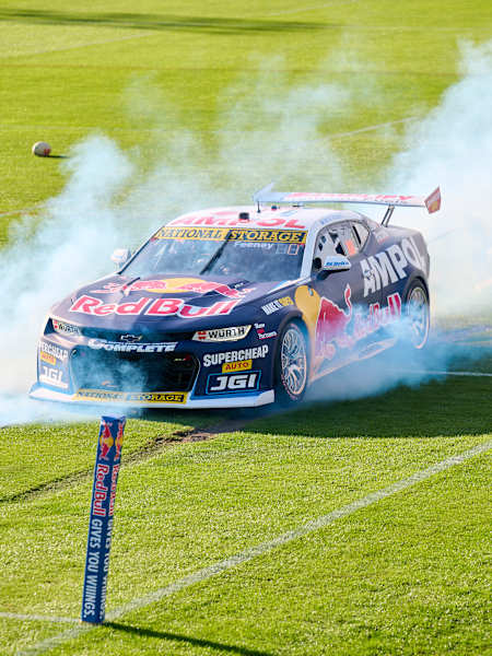 Supercar burning rubber with Canterbury-Bankstown Bulldogs players