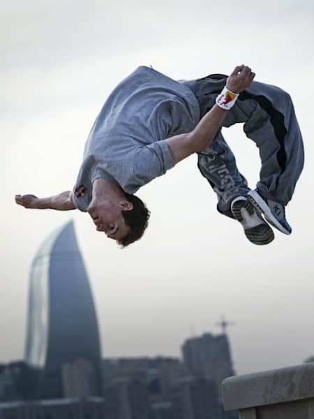 Ryan Doyle, from the United Kingdom, performs during Red Bull Parkour in Baku, Azerbaijan, on April 7, 2013.