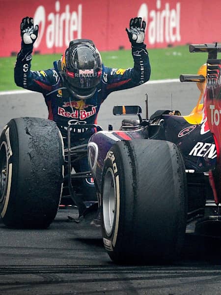 Sebastian Vettel salutes RB9