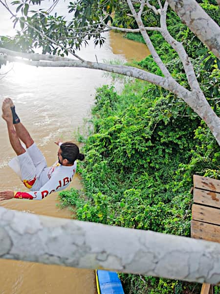 What makes professional cliff diving dangerous?