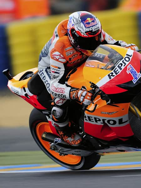 Repsol HRC Honda rider Casey Stoner competes during a MotoGP race.