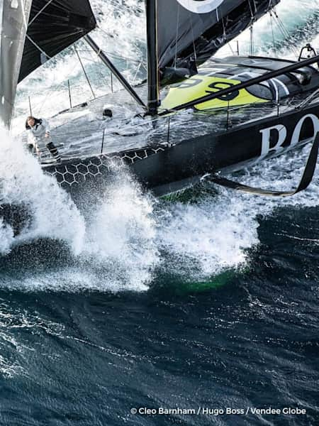 Alex Thompson in the Hugo Boss boat hits a big wave during the Vendee Globe solo round the world sailing race