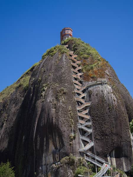 El Peñón de Guatapé volcanic outcrop in Antioquia, Colombia is a very popular tourist attractions that overlooks Guatapé reservoir