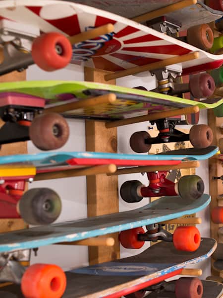 A collection of skateboards on display.
