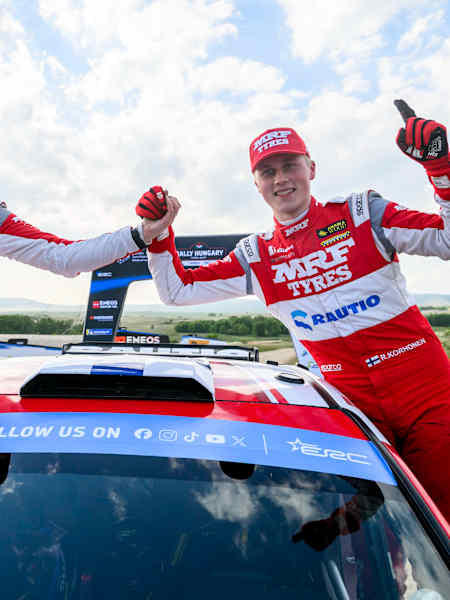 Anssi Viinikka and Roope Korhonen celebrate winning Rally Hungary