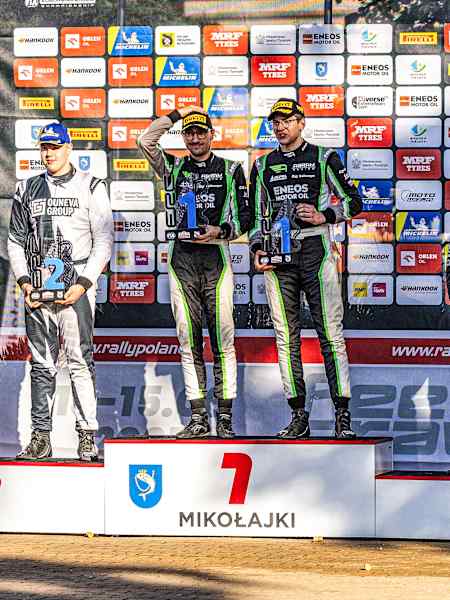 Tymek Abramowski stands atop the ERC3 podium at ORLEN OIL 81st Rally Poland
