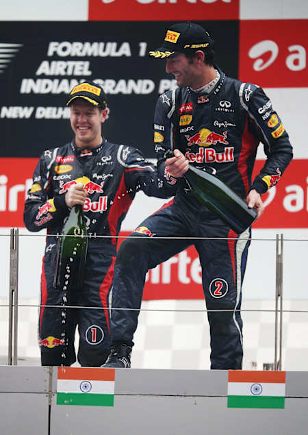 Sebastian Vettel and Mark Webber on the podium at the 2012 Indian GP