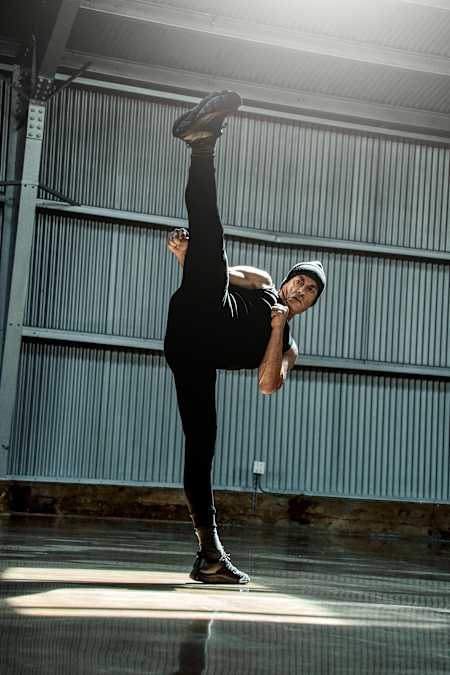 Van Damme shows off one of his trademark moves at Milk Studios in Hollywood.