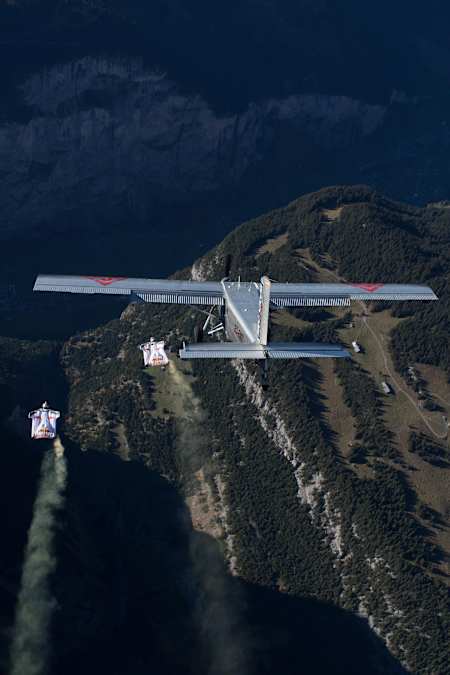 Fred Fugen and Vince Reffet about to pilot their wingsuits into a plane.